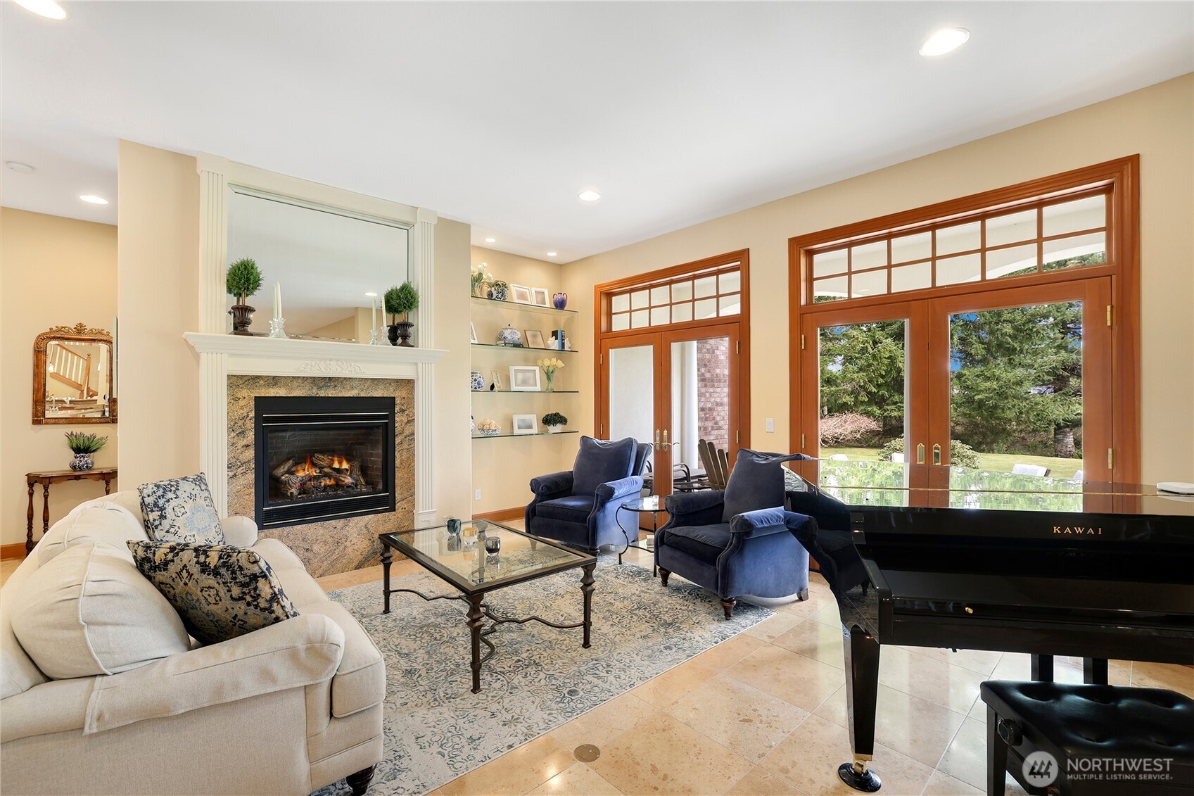 7007 Muirkirk Lane Southwest Port Orchard, WA 98367 - Photo 3 of 40 a living room with furniture a fireplace and large windows