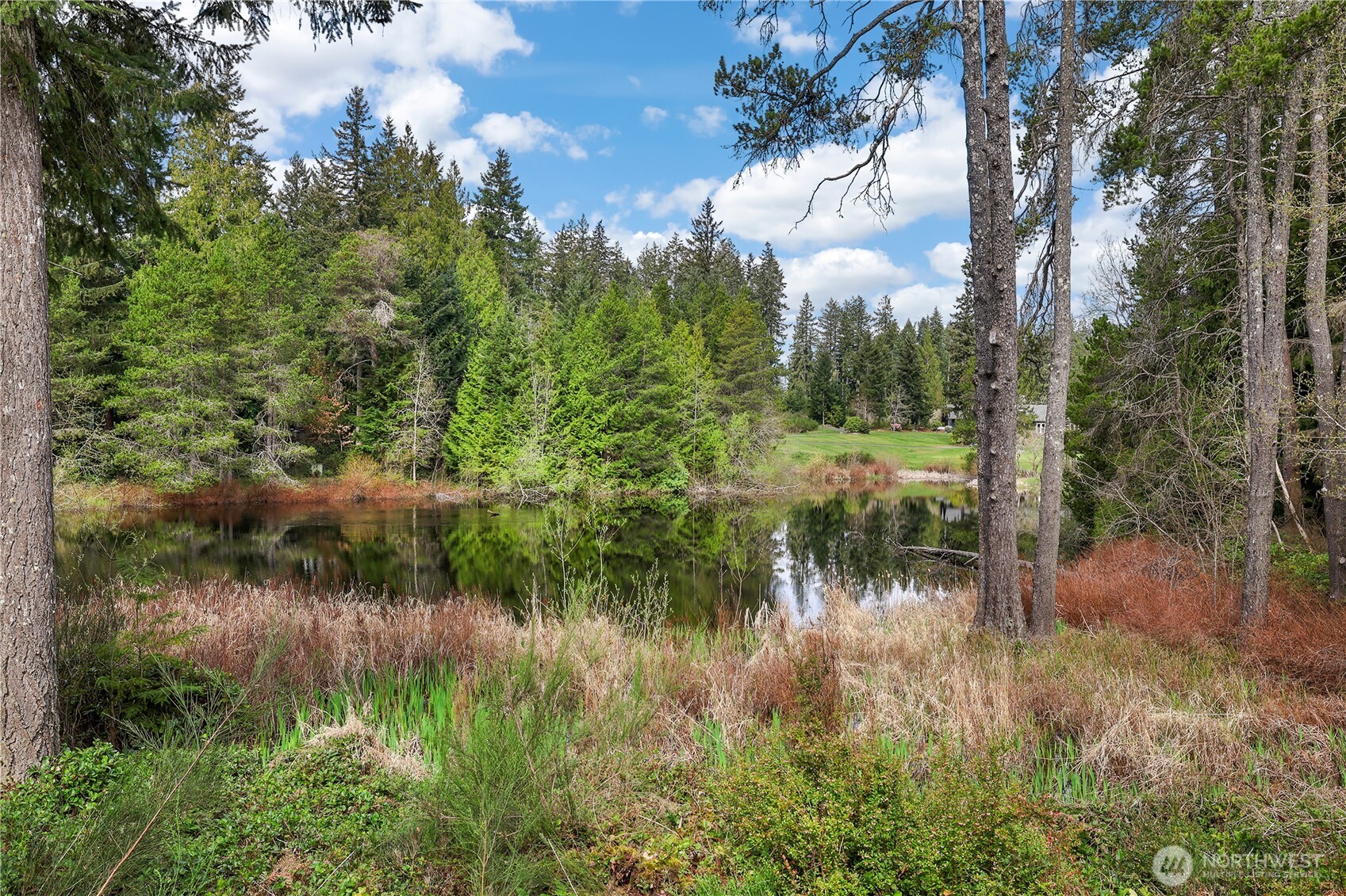 7007 Muirkirk Lane Southwest Port Orchard, WA 98367 - Photo 31 of 40 a view of lake with green space