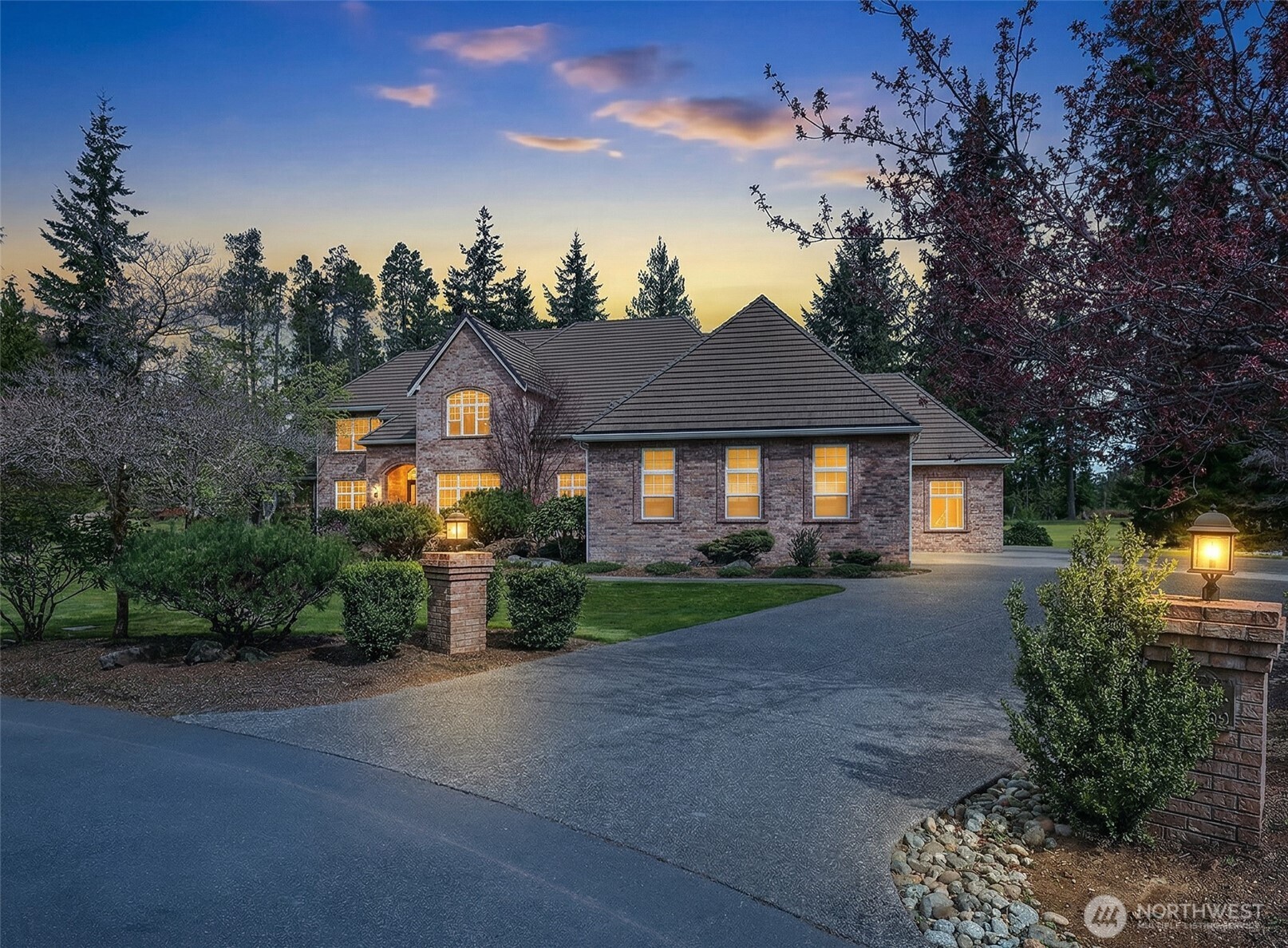 7007 Muirkirk Lane Southwest Port Orchard, WA 98367 - Photo 40 of 40 a front view of a house with a yard and outdoor seating