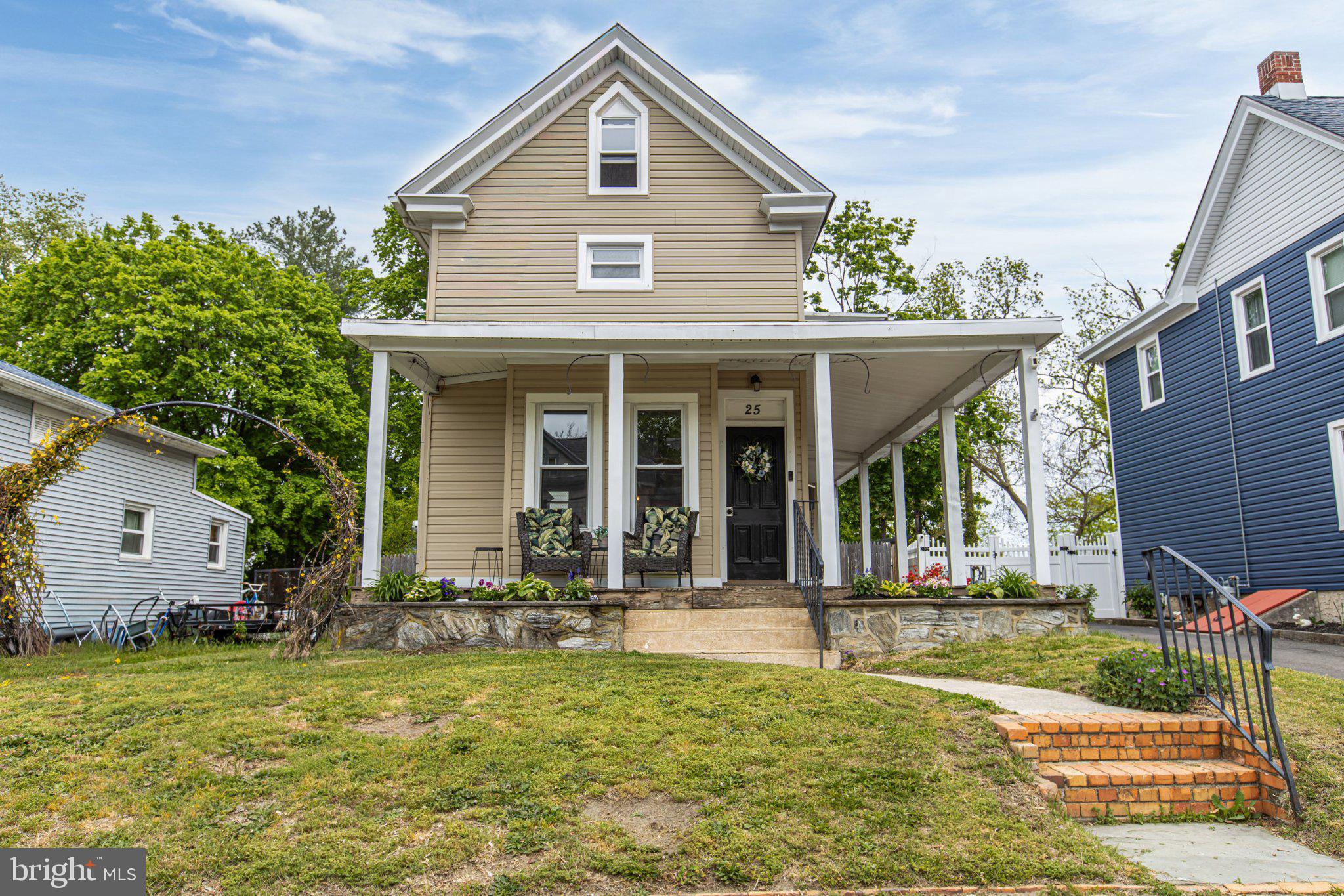 Charming home with inviting porch.