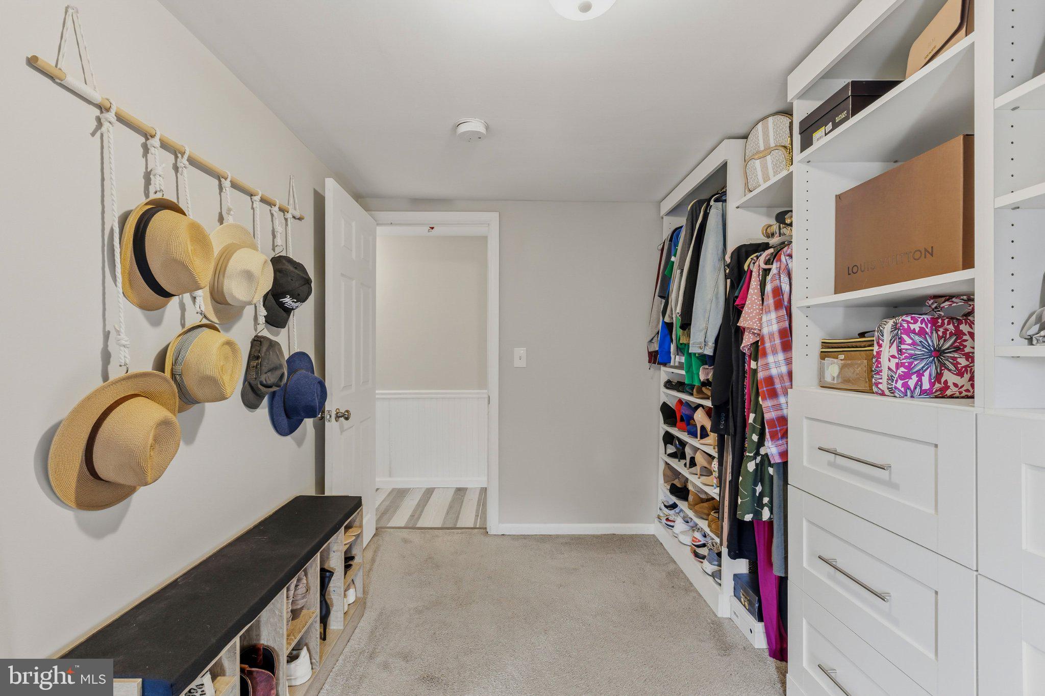 25 Maple Street Clayton, NJ 08312 - Photo 29 of 36 Stylish closet with organized storage.