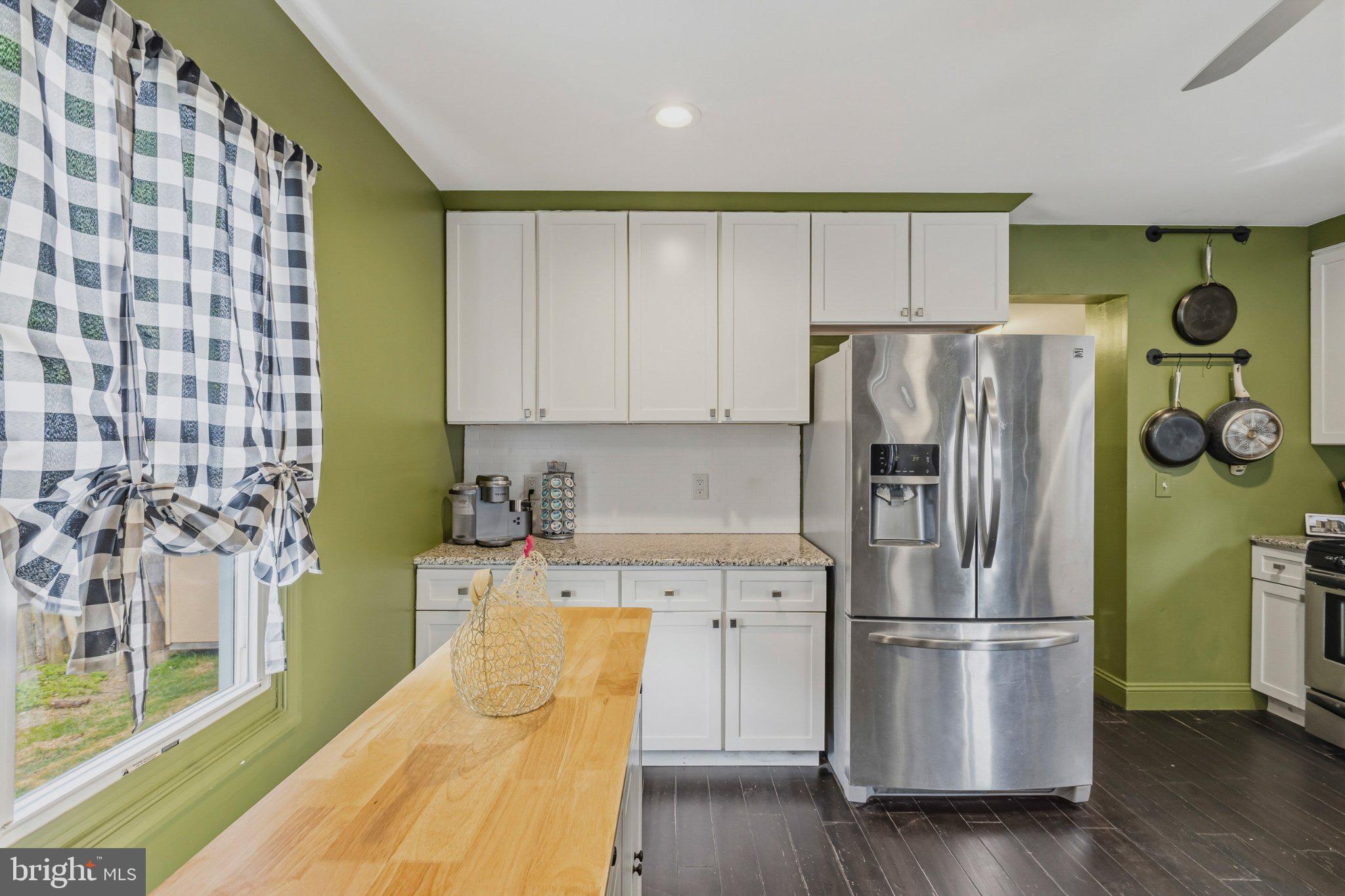25 Maple Street Clayton, NJ 08312 - Photo 9 of 36 Charming kitchen with modern flair.