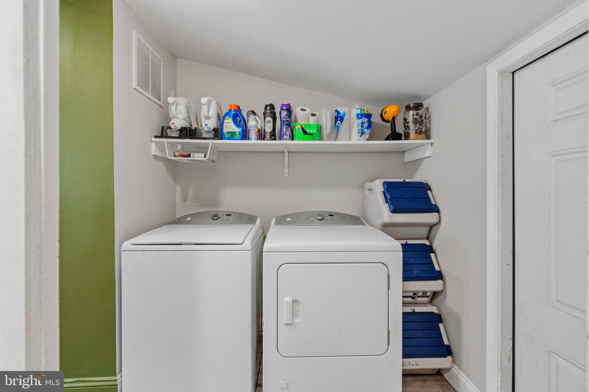 25 Maple Street Clayton, NJ 08312 - Photo 10 of 36 Efficient laundry space with storage.
