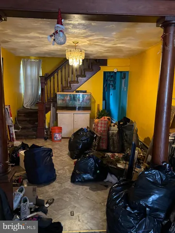 a room with lots of chairs and mirrors