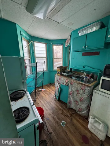 a room with furniture and a wooden floor