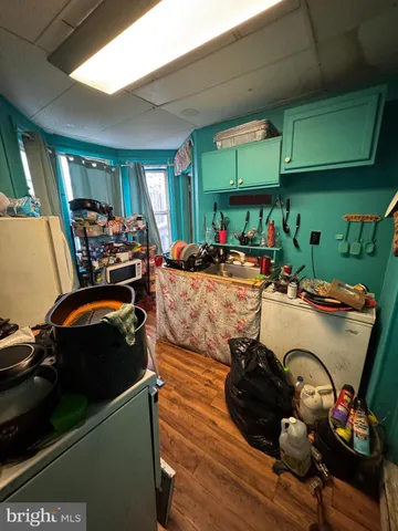 a front view of a house with sitting area