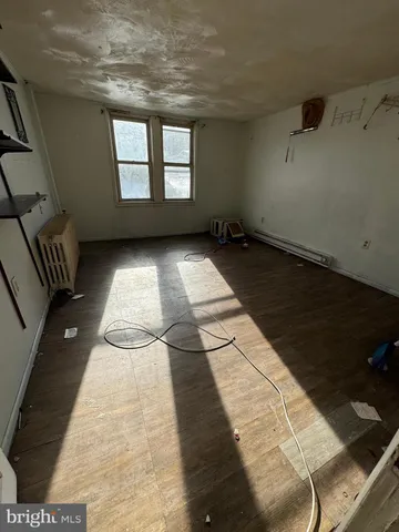 a view of empty room with windows