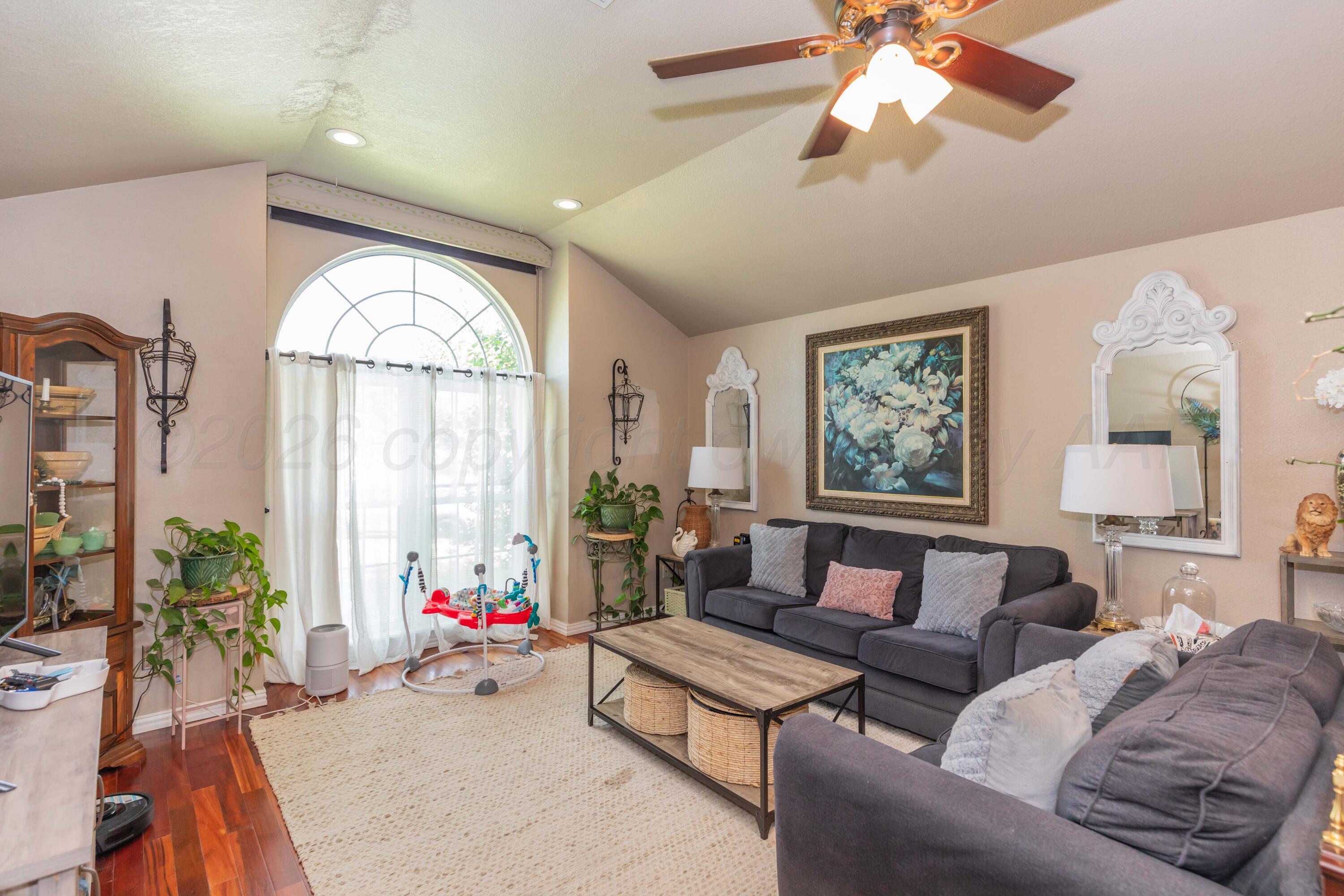 8303 Ranier Drive Amarillo, TX 79110 - Photo 4 of 27 LIVING ROOM VIEW 1