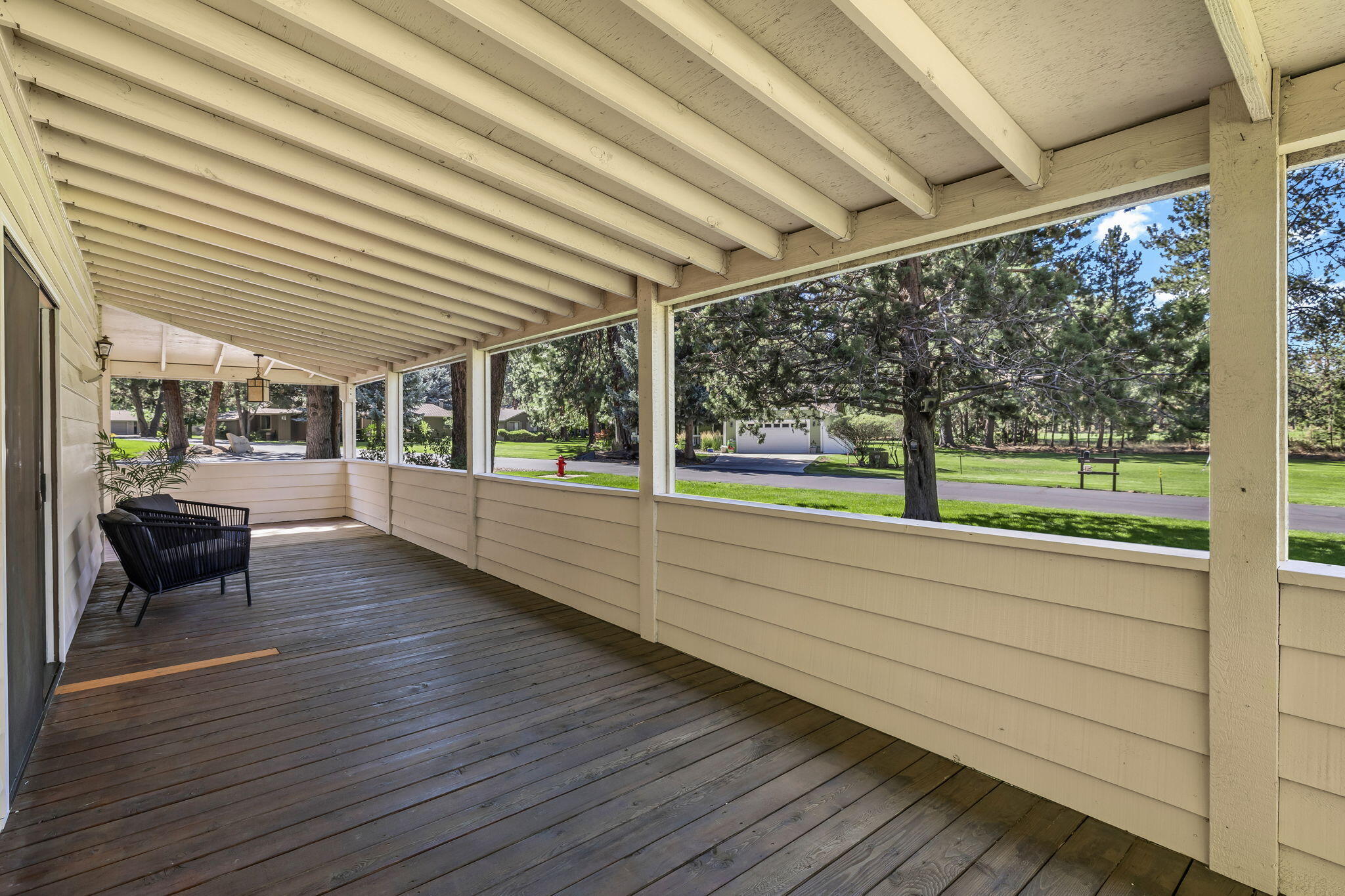 20408 Butt Riggin Road Bend, OR 97702 - Photo 28 of 36 a view of a porch and garden