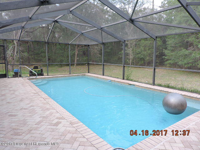 1156 Arlanie Road Brooksville, FL 34604 - Photo 4 of 27 a view of a indoor basketball court