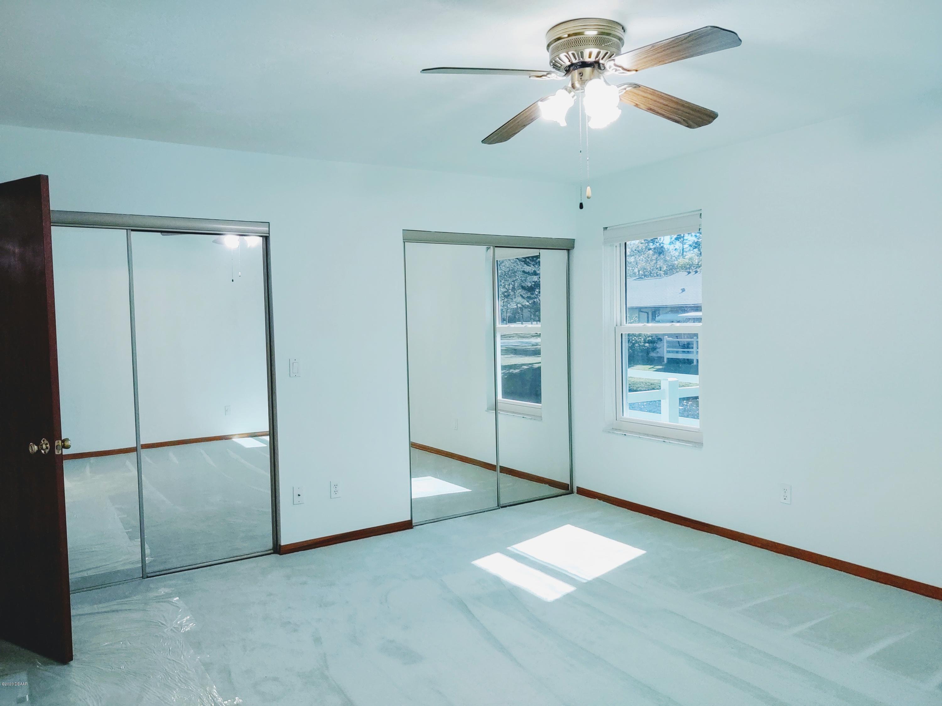 102 Rustic Pond Road Port Orange, FL 32128 - Photo 13 of 32 Master Bedroom