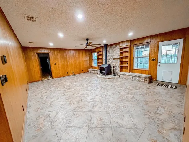 a view of front door with wooden floor