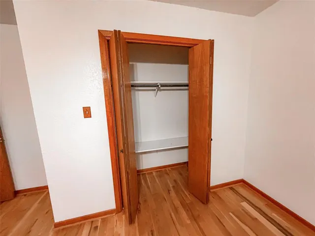 a bathroom with a toilet and shower