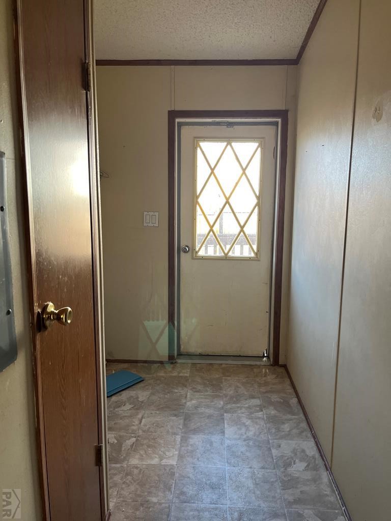 805 7th Street Fowler, CO 81039 - Photo 13 of 20 an empty room with windows