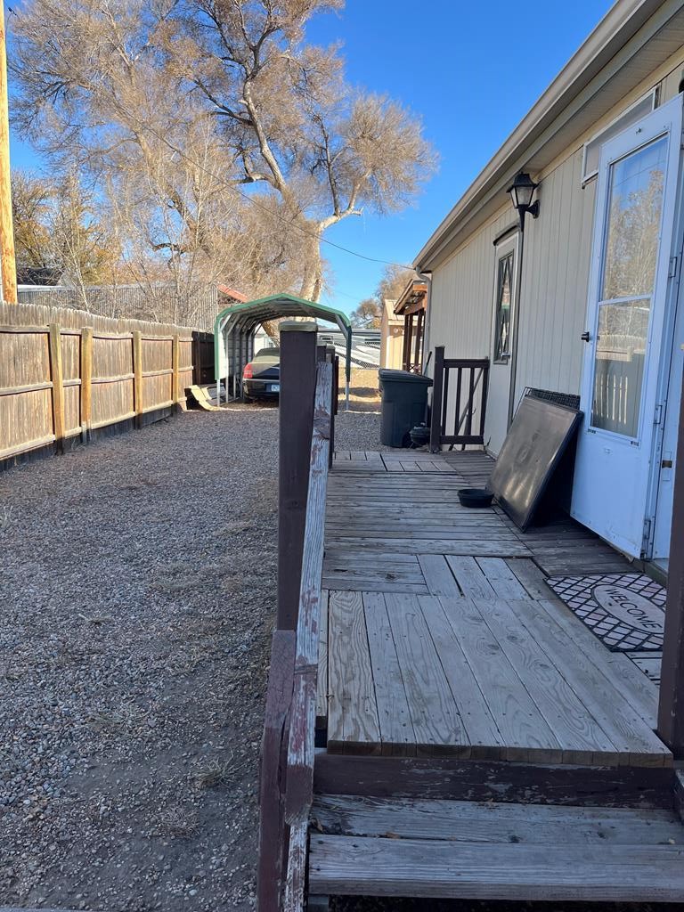 805 7th Street Fowler, CO 81039 - Photo 15 of 20 a view of outdoor space with wooden floor and seating