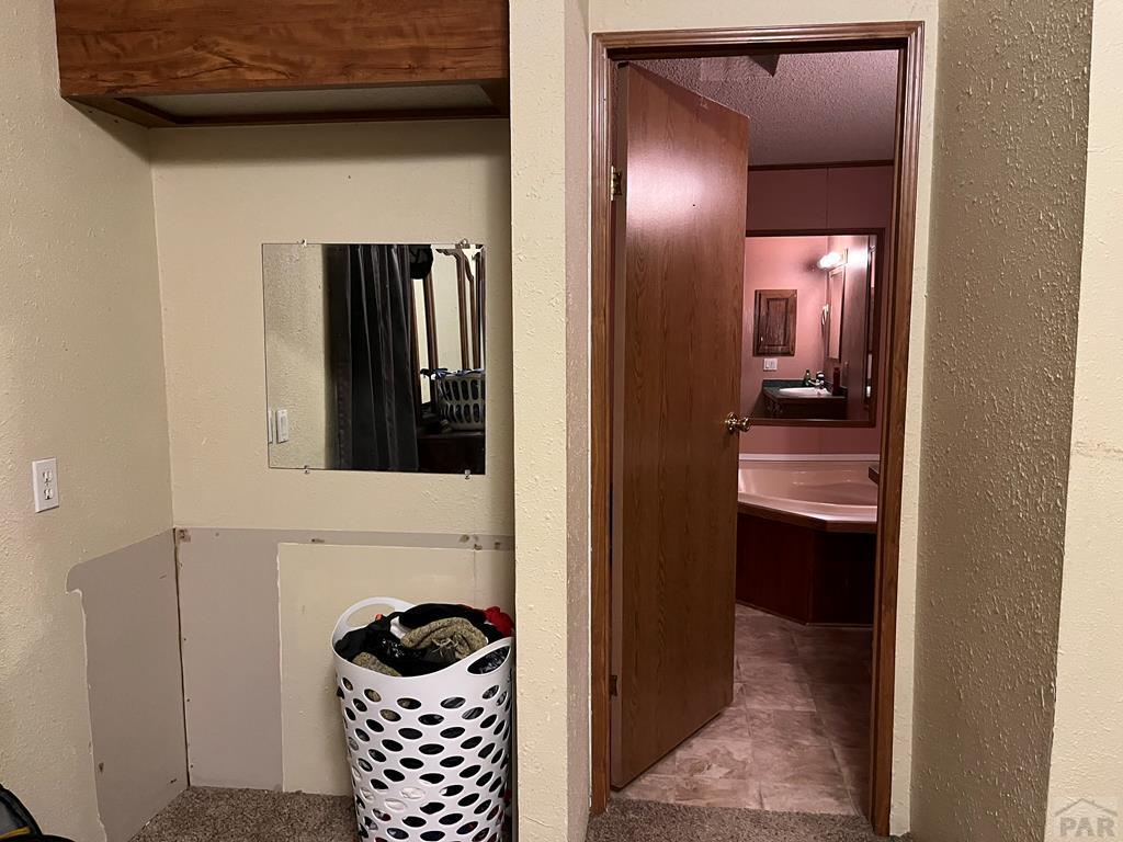 805 7th Street Fowler, CO 81039 - Photo 10 of 20 a bathroom with a sink and a mirror