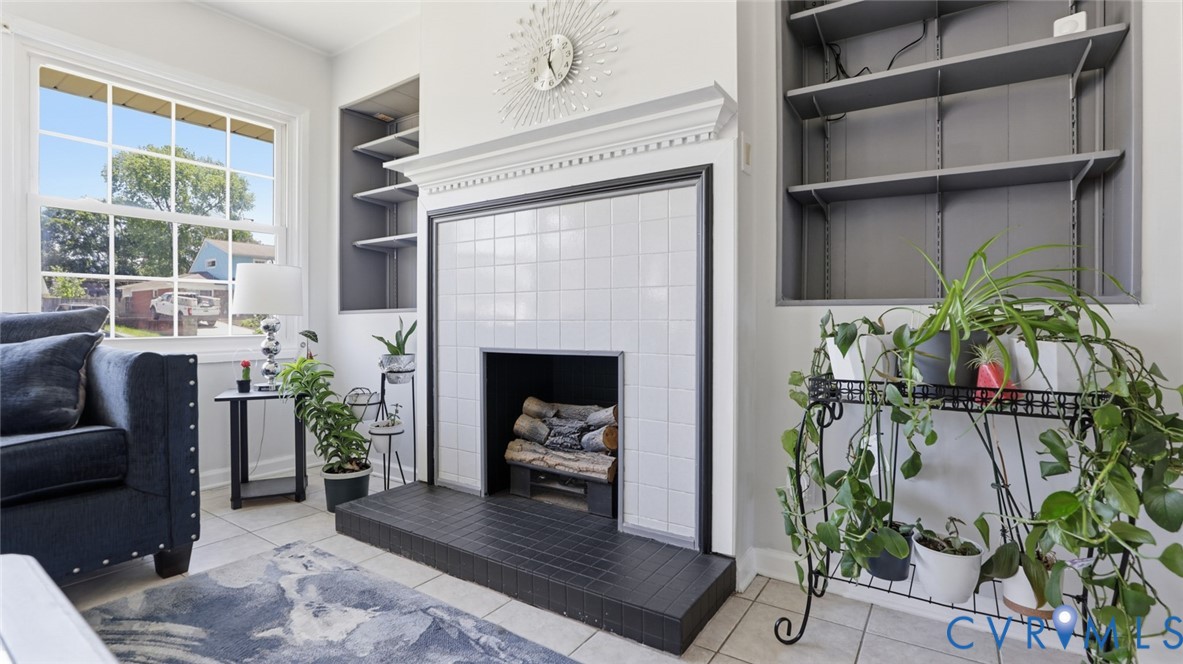 1310 Andover Road Henrico, VA 23229 - Photo 12 of 43 Living area featuring a tiled fireplace with a bla