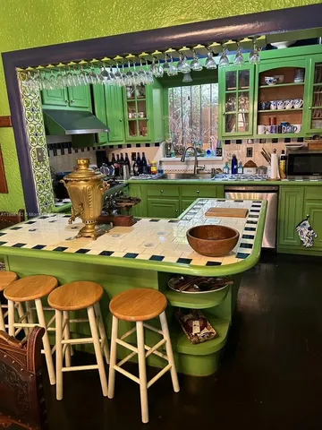 a living room with a couch and a fireplace