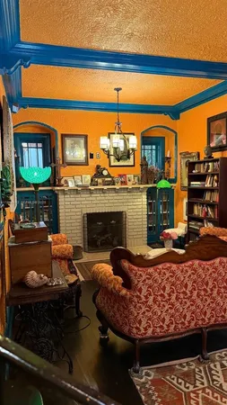 a living room with a fireplace