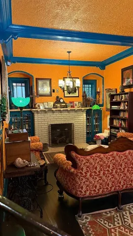 a living room with furniture and window