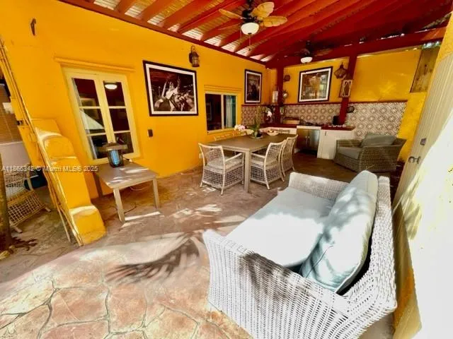 a view of a backyard with a patio