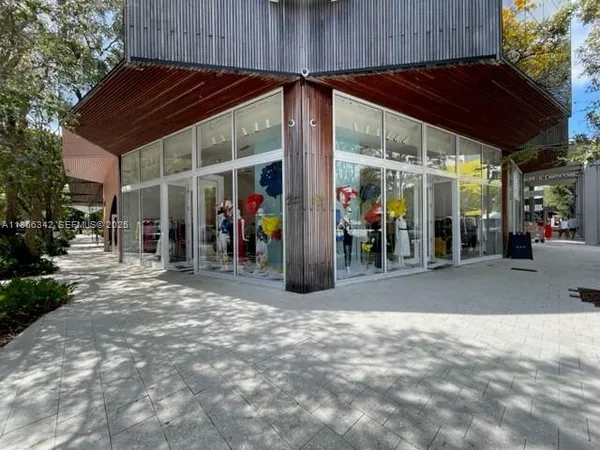 a view of a chairs and tables in patio