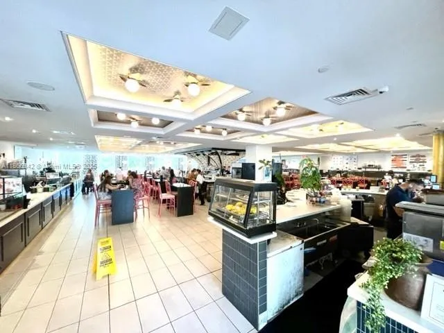 a view of a street with cars