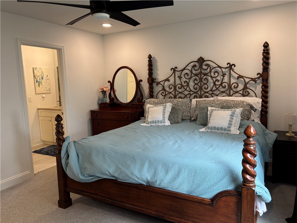 318 Sand Castle Lane, Unit A St. Simons Island, GA 31522 - Photo 22 of 31 Primary bedroom with en-suite bath