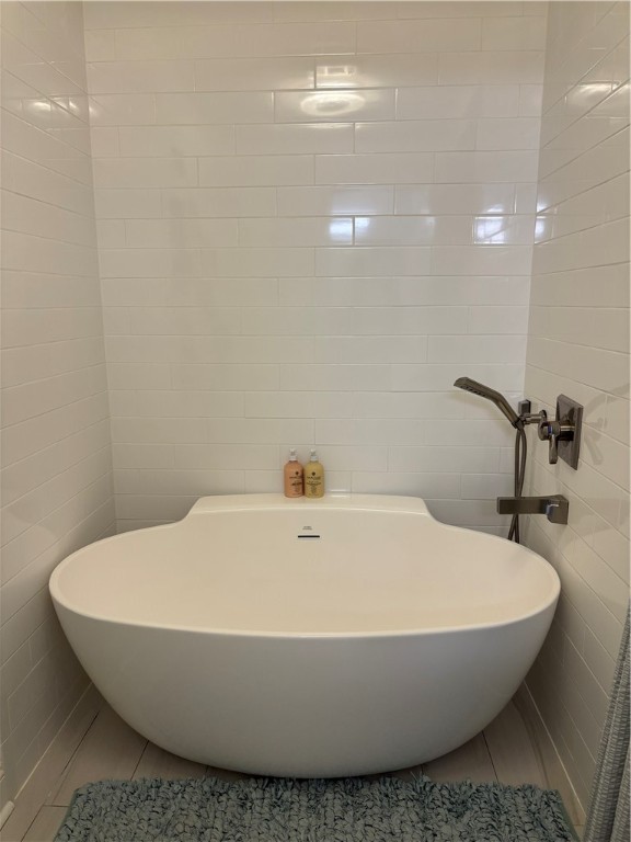 318 Sand Castle Lane, Unit A St. Simons Island, GA 31522 - Photo 25 of 31 Large soaking tub with hand-held shower