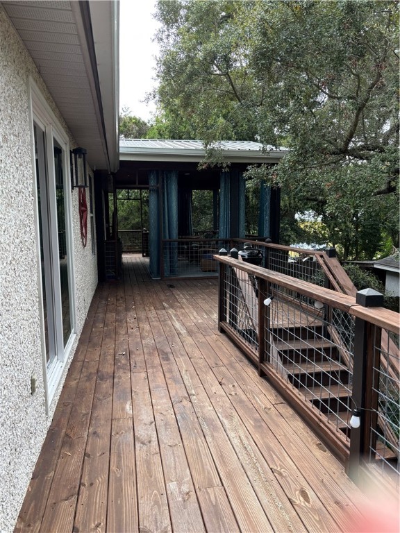 318 Sand Castle Lane, Unit A St. Simons Island, GA 31522 - Photo 29 of 31 Deck to stairs and covered porch