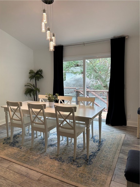 318 Sand Castle Lane, Unit A St. Simons Island, GA 31522 - Photo 5 of 31 Dining area with sliding door to deck