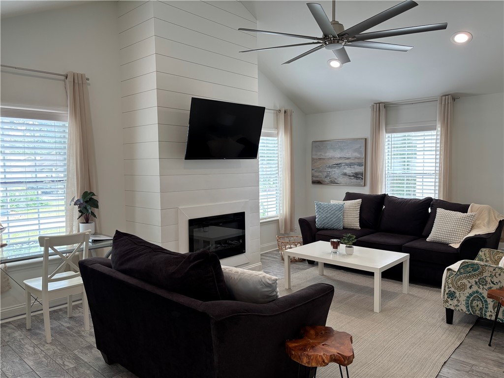 318 Sand Castle Lane, Unit A St. Simons Island, GA 31522 - Photo 7 of 31 Living room with fireplace