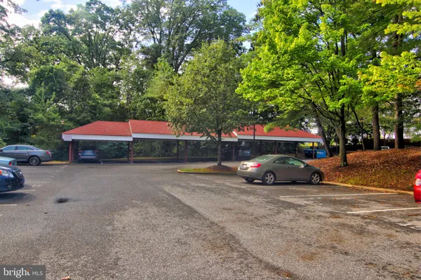 a view of street with parked cars
