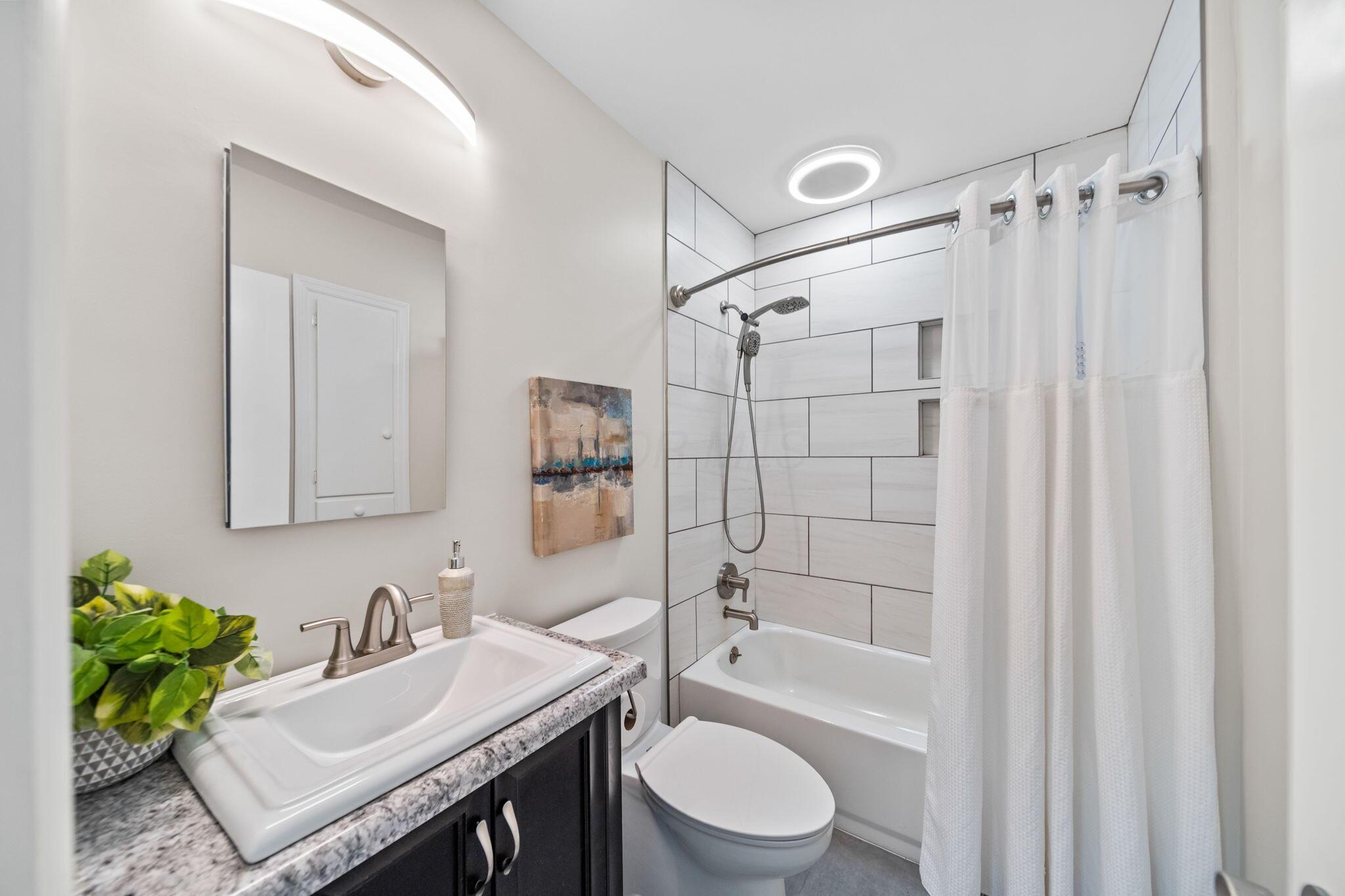 2026 Jervis Road Columbus, OH 43221 - Photo 28 of 89 First fl remodeled full bath
