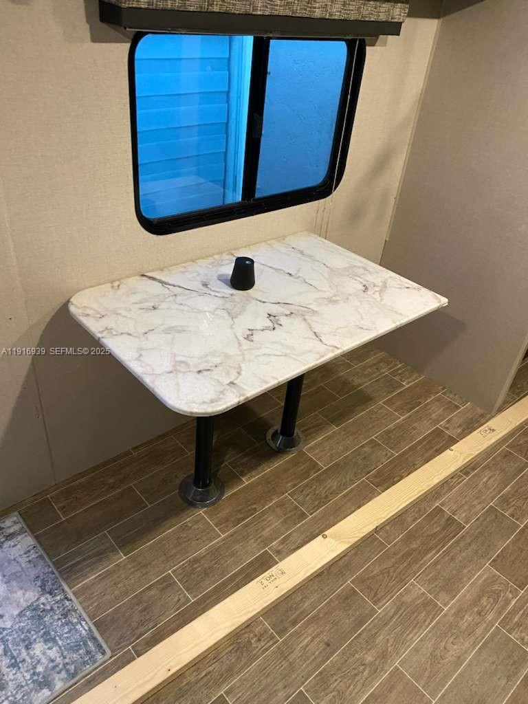25236 Southwest 133rd Avenue Homestead, FL 33032 - Photo 6 of 18 a picture of table