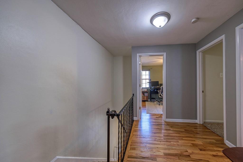 9120 Collington Square Allison Park, PA 15101 - Photo 28 of 38 a view of a hallway view with wooden floor and a livingroom with entryway