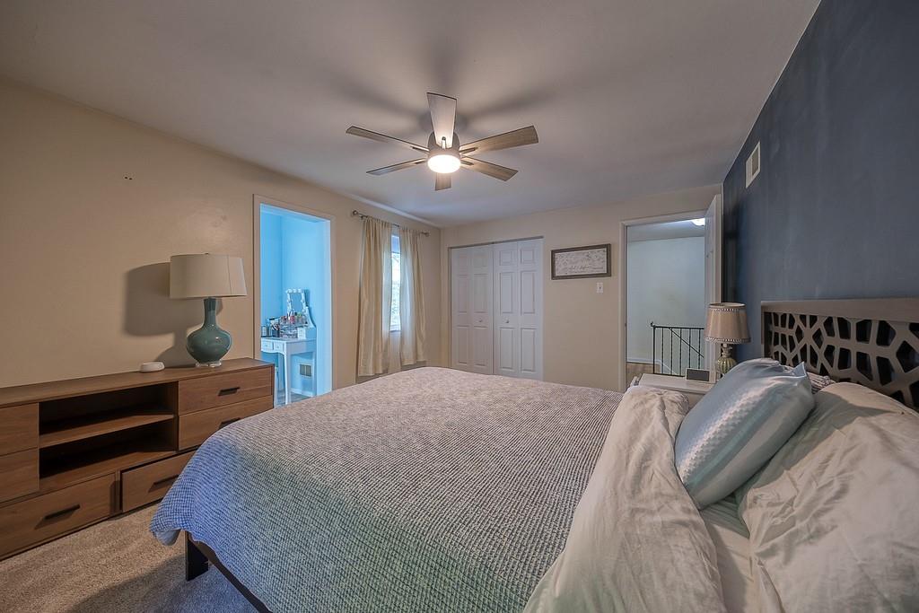 9120 Collington Square Allison Park, PA 15101 - Photo 31 of 38 a bedroom with a bed and a chandelier