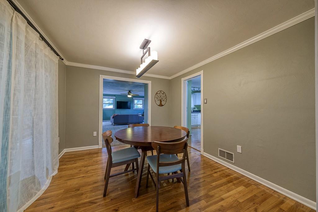 9120 Collington Square Allison Park, PA 15101 - Photo 9 of 38 a view of a dining room with furniture and wooden floor