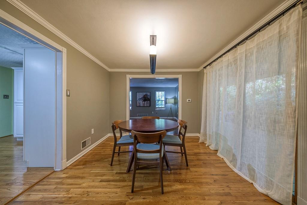 9120 Collington Square Allison Park, PA 15101 - Photo 10 of 38 a view of a hallway with furniture and wooden floor