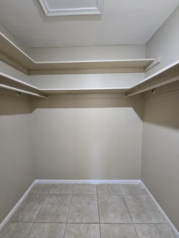 a view of an empty walk in closet