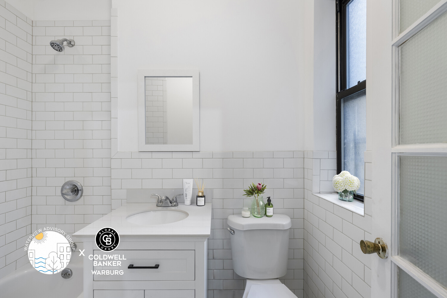 1793 Riverside Drive, Unit 2G Manhattan, NY 10034 - Photo 7 of 12 a bathroom with a sink toilet and shower