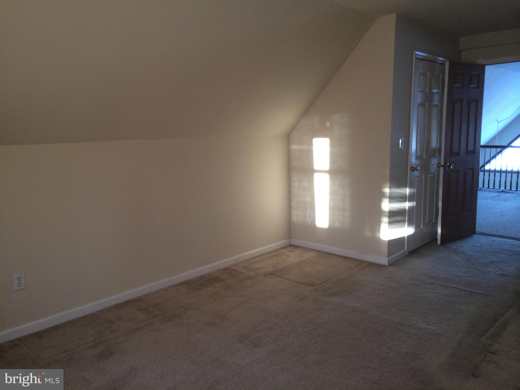 324 St Georges Road Baltimore, MD 21221 - Photo 13 of 15 a view of empty room with window