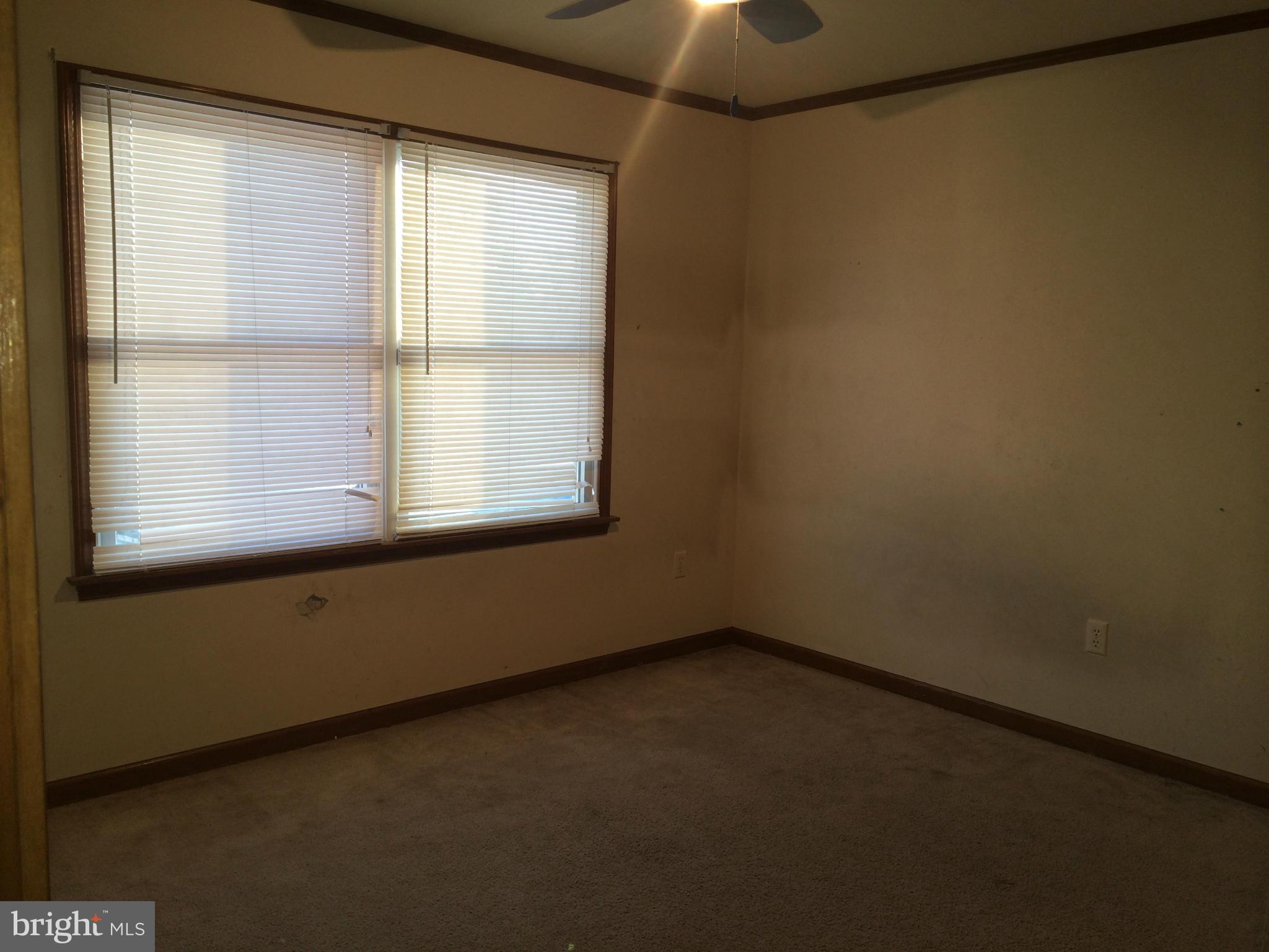 324 St Georges Road Baltimore, MD 21221 - Photo 14 of 15 a view of an empty room with a window