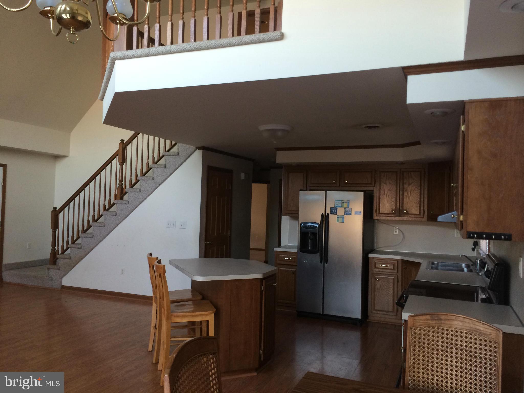 324 St Georges Road Baltimore, MD 21221 - Photo 3 of 15 a view of kitchen and dining area with furniture
