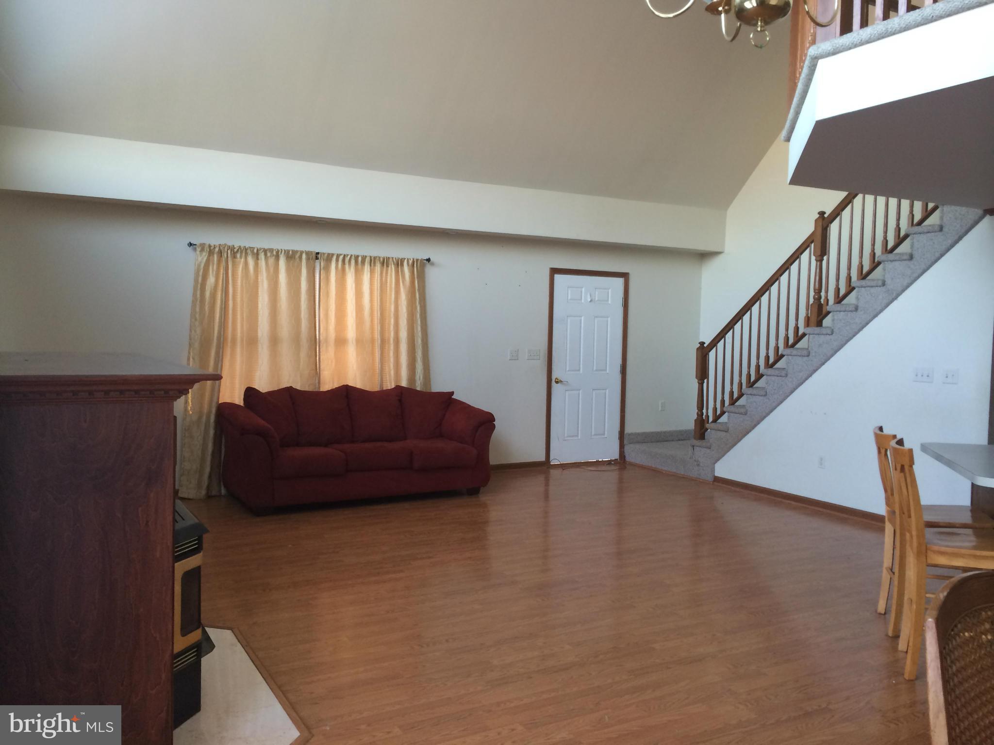 324 St Georges Road Baltimore, MD 21221 - Photo 5 of 15 a living room with furniture and a window