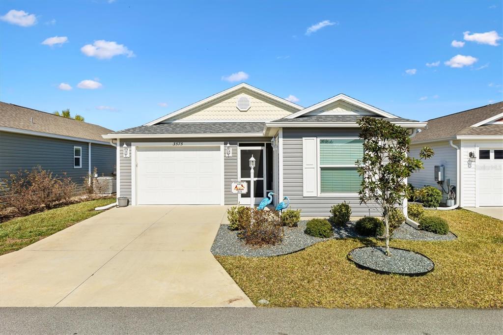 3575 Grouby Road The Villages, FL 32163 - Photo 1 of 1 a view of a house with backyard and sitting area