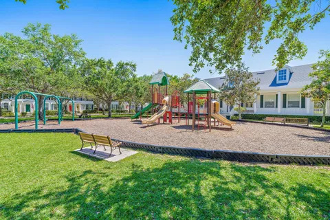 a park with bench and trees