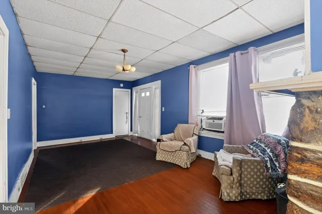 a view of livingroom with furniture and fireplace