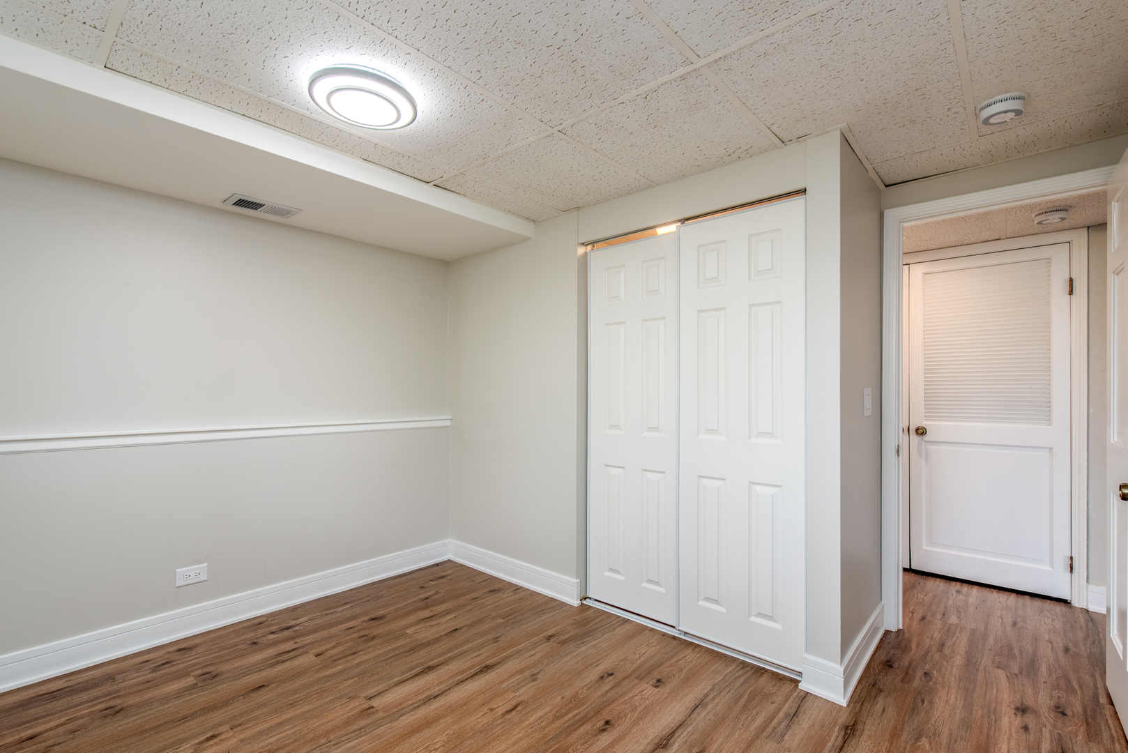 730 Circle Drive Roselle, IL 60172 - Photo 25 of 35 wooden floor in an empty room