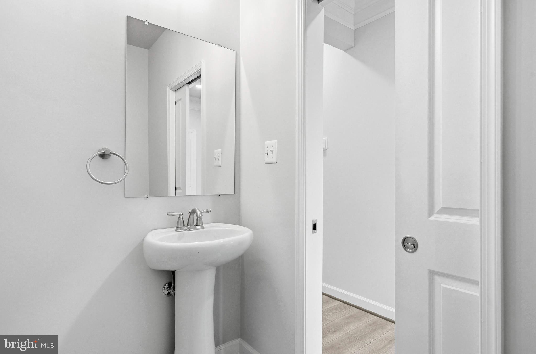 29725 Bruce Road Mechanicsville, MD 20659 - Photo 38 of 79 a bathroom with a sink and a mirror